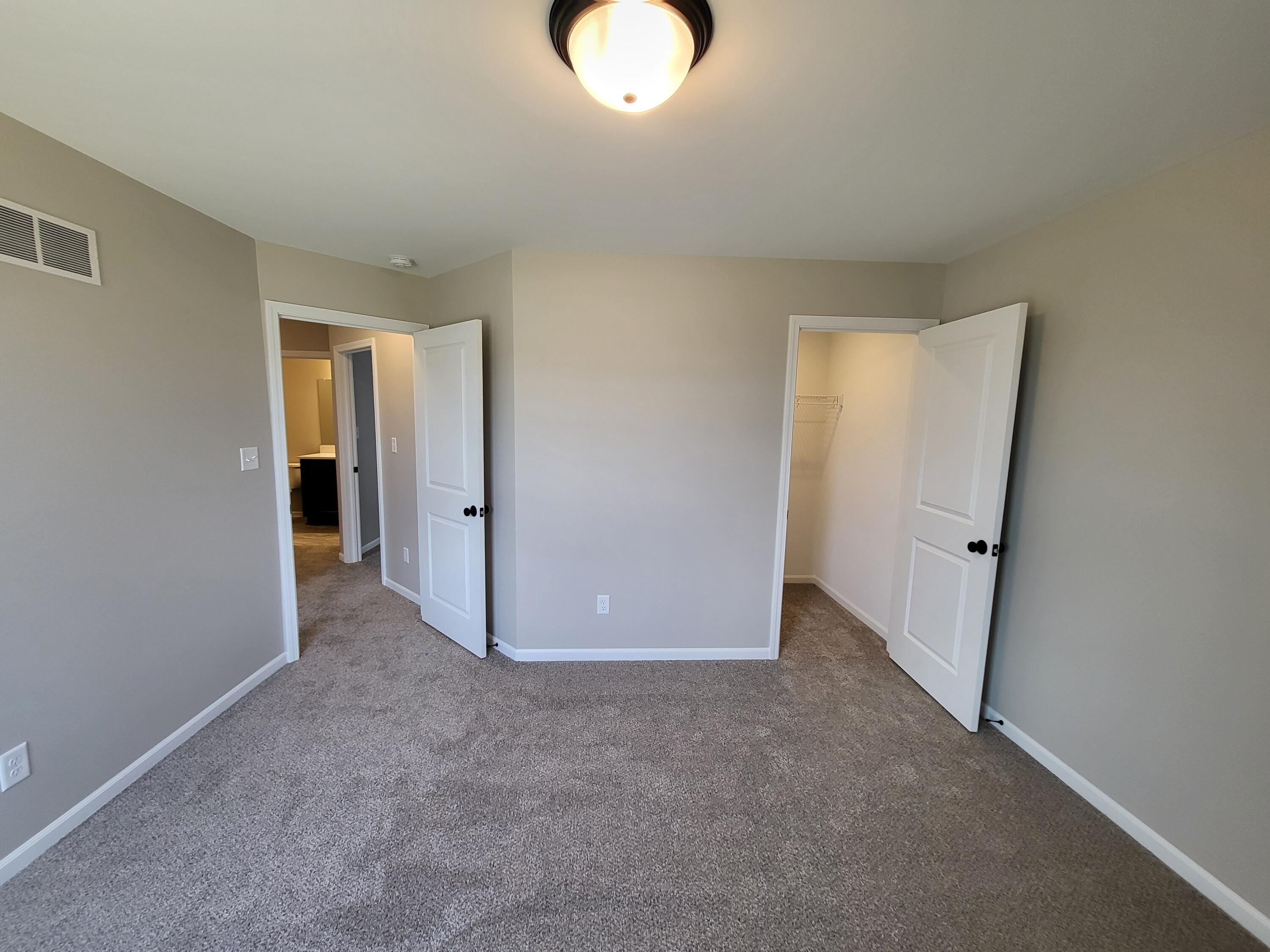 18425 Alexander Avenue Lowell, IN 46356 - Photo 25 of 34 an empty room with closet area