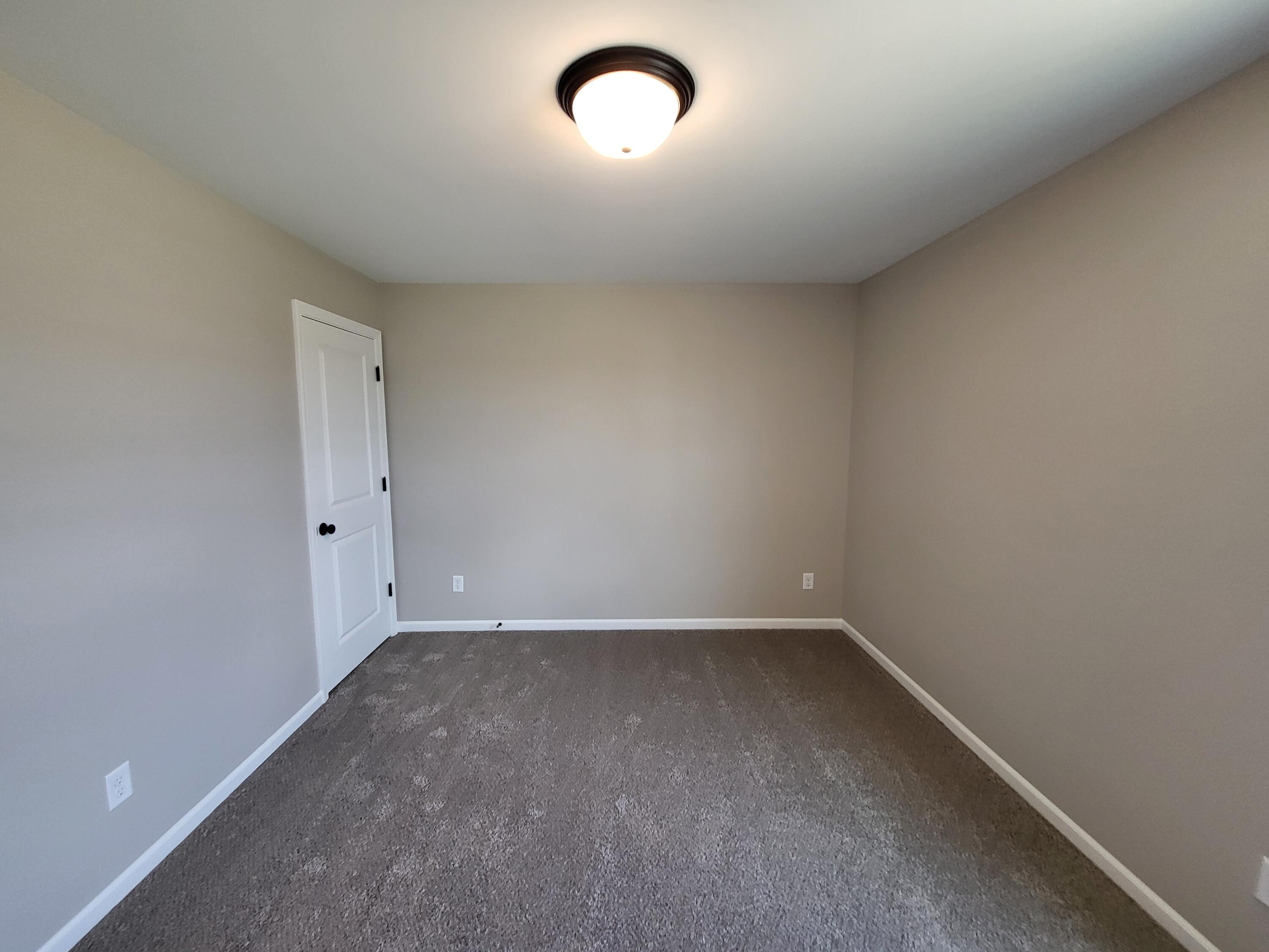 18425 Alexander Avenue Lowell, IN 46356 - Photo 30 of 34 an empty room with a window