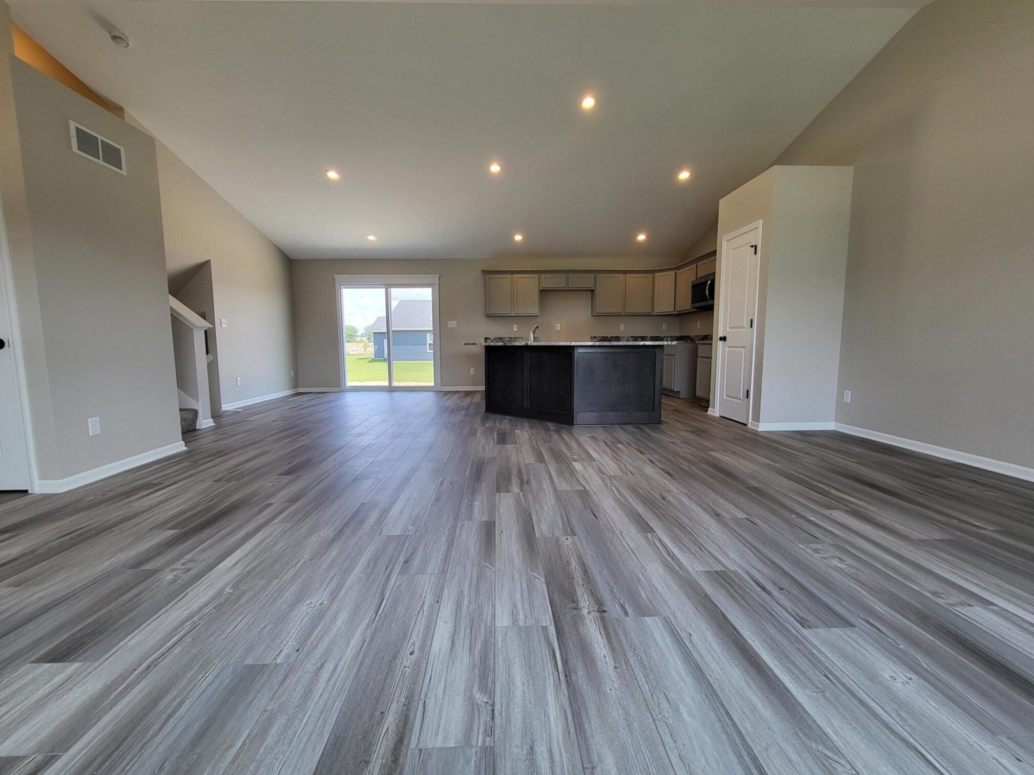 18425 Alexander Avenue Lowell, IN 46356 - Photo 5 of 34 a view of kitchen view wooden floor and stainless steel appliances
