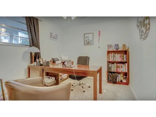 a living room with furniture and window
