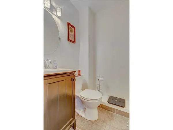 a bathroom with a toilet and a sink