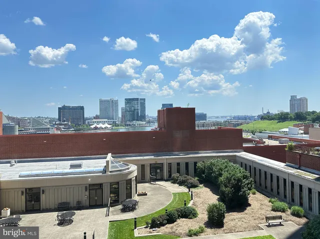 a view of a balcony with city view