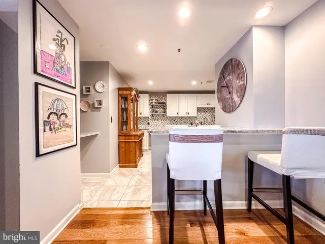 a view of kitchen with cabinets and outdoor space