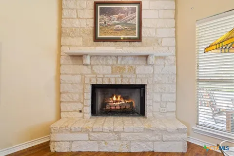 a white building with a fireplace