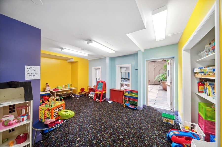 3100 North Sheridan Road, Unit 4B Chicago, IL 60657 - Photo 18 of 19 a view of play room with toys and a large window
