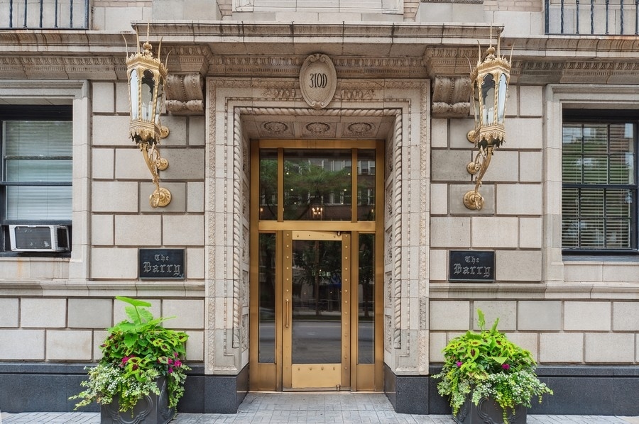 3100 North Sheridan Road, Unit 4B Chicago, IL 60657 - Photo 2 of 19 a front view of a building with potted plants