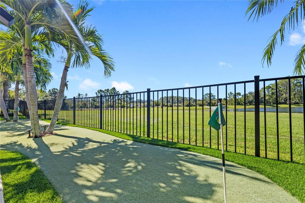 8764 Lookout Pointe Drive Windermere, FL 34786 - Photo 6 of 53 a view of swimming pool with a table and chairs