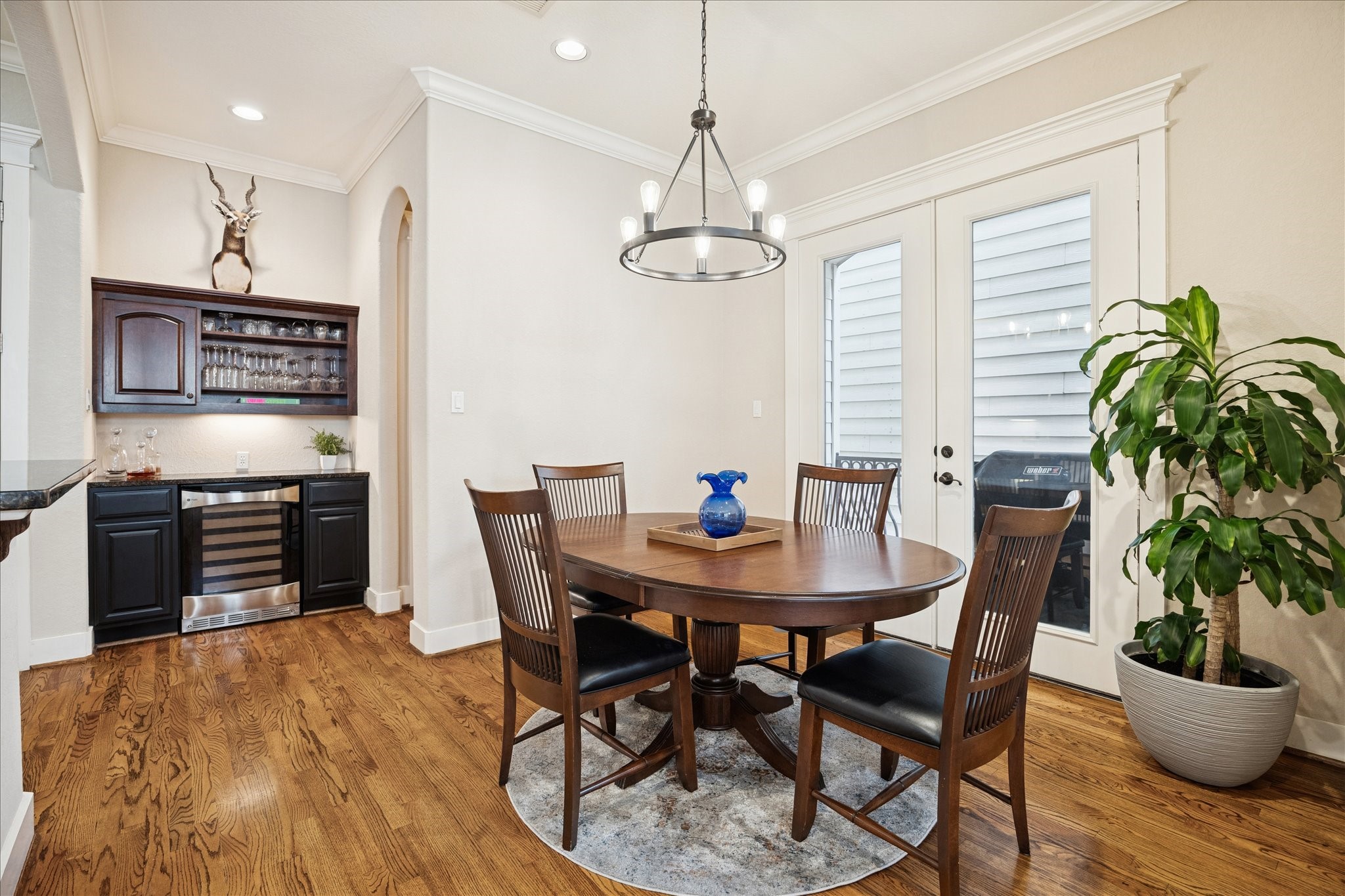 934 West 22nd Street, Unit B Houston, TX 77008 - Photo 11 of 29 a view of a dining room with furniture window and wooden floor