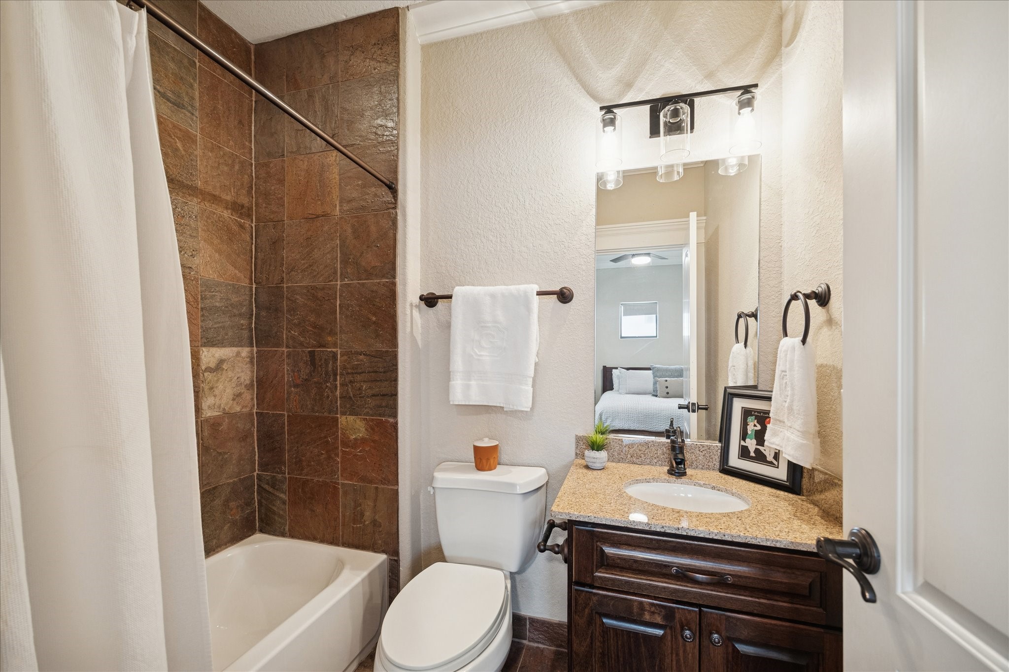 934 West 22nd Street, Unit B Houston, TX 77008 - Photo 28 of 29 a bathroom with a sink a toilet and shower
