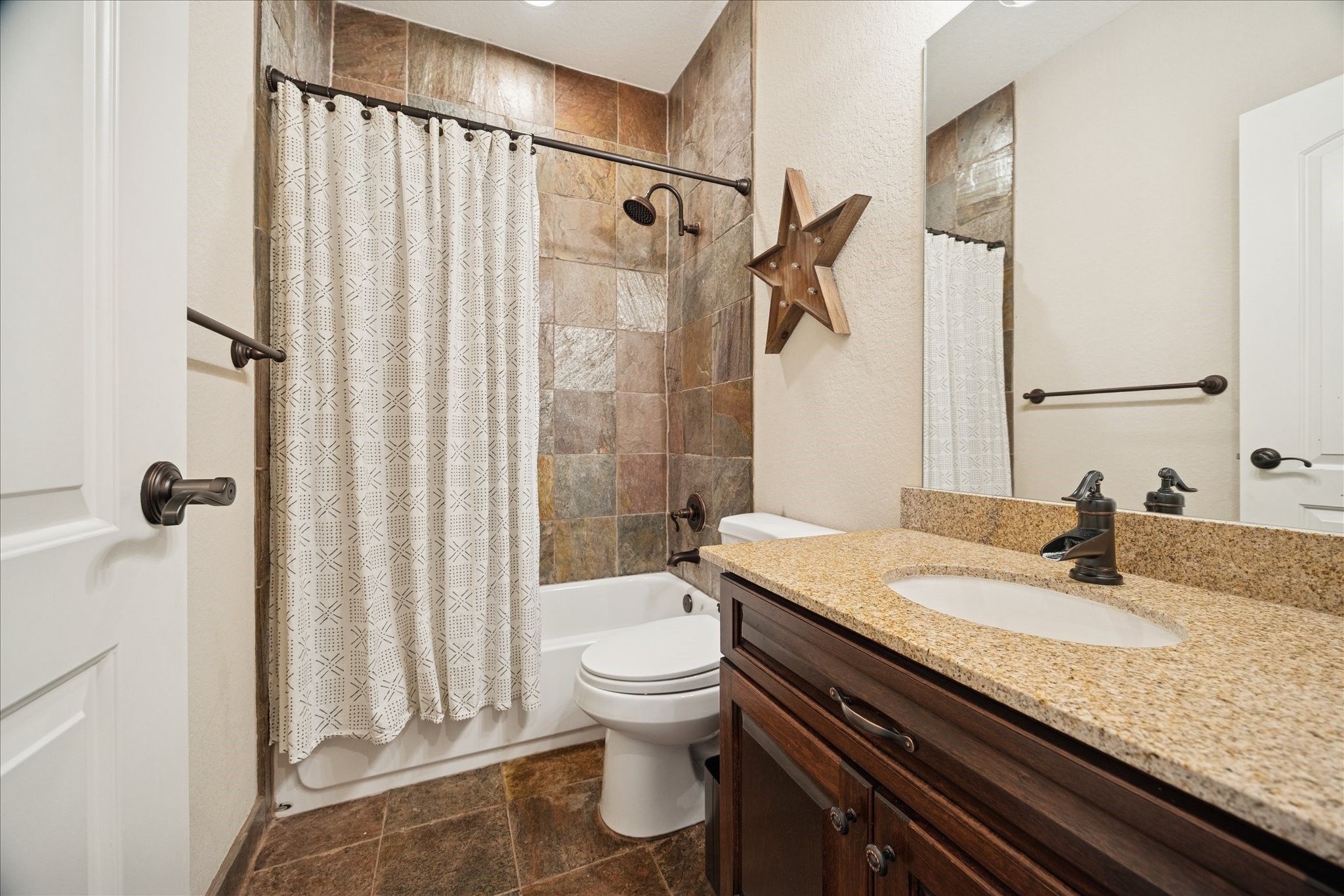 934 West 22nd Street, Unit B Houston, TX 77008 - Photo 29 of 29 a bathroom with a granite countertop sink toilet and shower