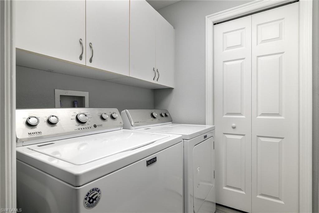 2090 Aberdeen Lane, Unit 101 Naples, FL 34109 - Photo 16 of 37 a utility room with dryer and washer