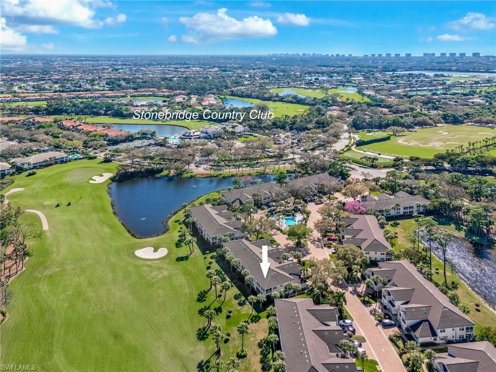 2090 Aberdeen Lane, Unit 101 Naples, FL 34109 - Photo 19 of 37 an aerial view of residential houses with outdoor space