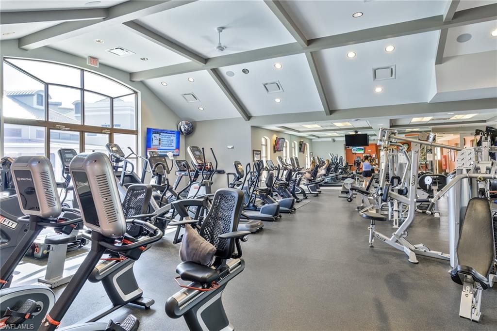 2090 Aberdeen Lane, Unit 101 Naples, FL 34109 - Photo 31 of 37 a view of a room with gym equipment