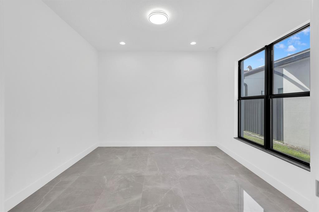 8571 Shoreacres Street Boca Raton, FL 33434 - Photo 30 of 95 6th Bedroom (1st Floor) with double Sliding Doors/ Flex to office and short access to Cabana Bathroom