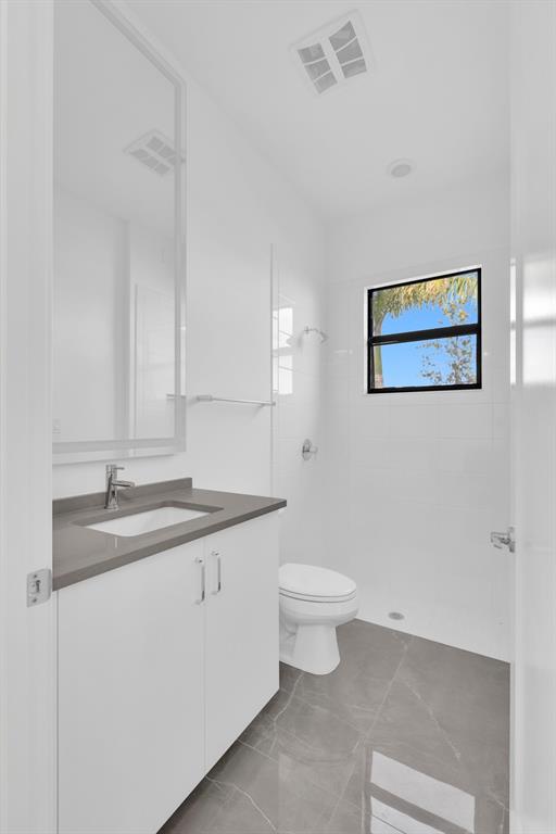 8571 Shoreacres Street Boca Raton, FL 33434 - Photo 31 of 95 Inside/outside Cabana Bath with Shower and Patio access