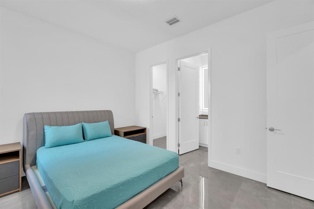 8571 Shoreacres Street Boca Raton, FL 33434 - Photo 33 of 95 Suite 1st floor (5th Suite) with porcelain floors