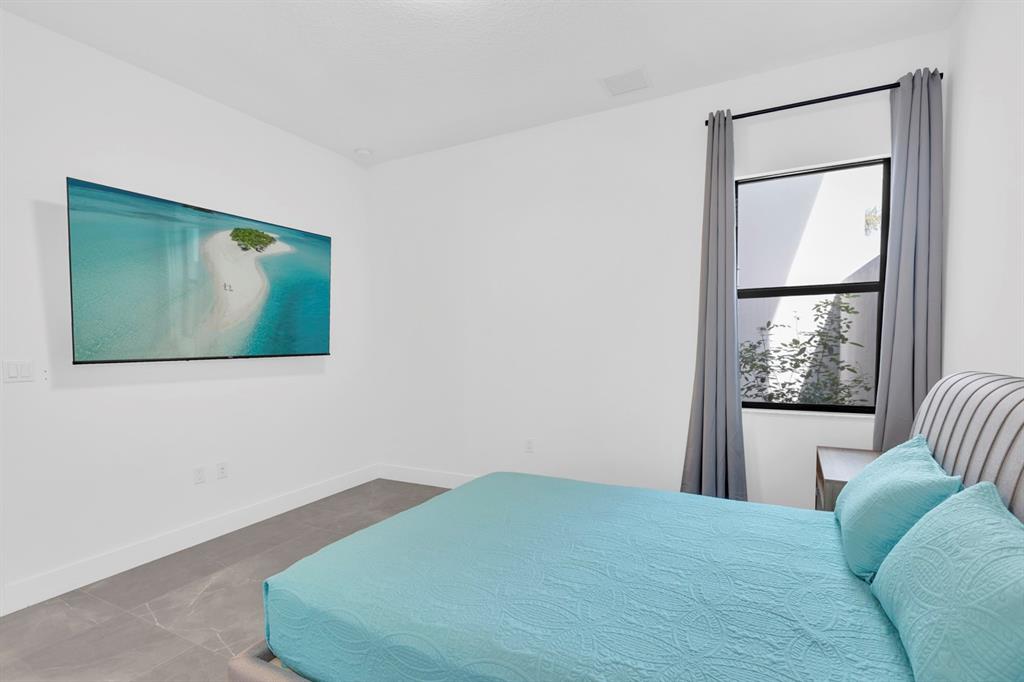 8571 Shoreacres Street Boca Raton, FL 33434 - Photo 36 of 95 Suite 1st Floor (5th Suite) with porcelain Floors