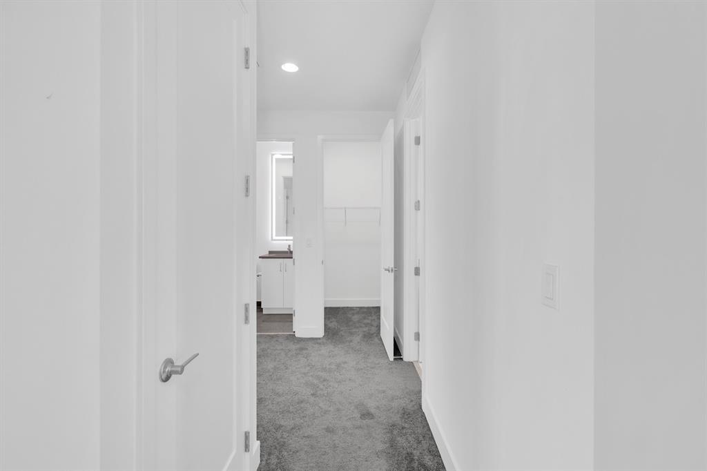 8571 Shoreacres Street Boca Raton, FL 33434 - Photo 53 of 95 Hallway to Movie Theater Room, Powder room & Laundry on 2nd Floor