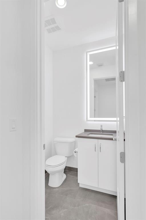 8571 Shoreacres Street Boca Raton, FL 33434 - Photo 54 of 95 Powder Room 2nd Floor on the side of Movie Theater Room