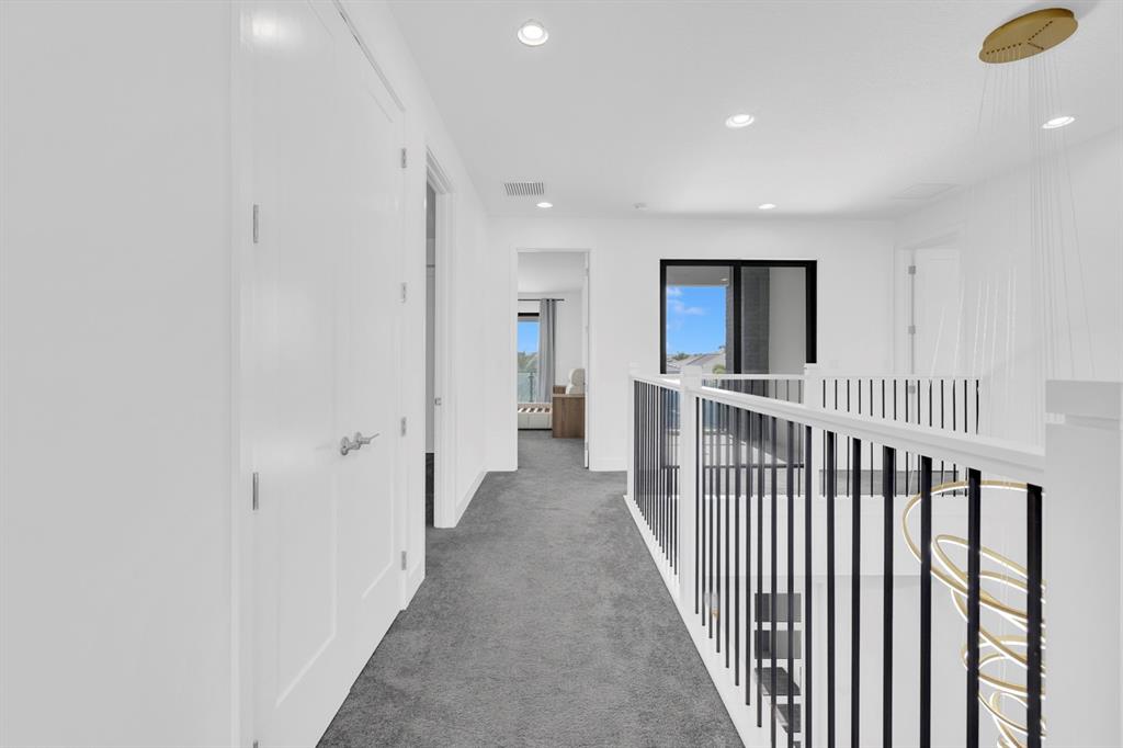 8571 Shoreacres Street Boca Raton, FL 33434 - Photo 57 of 95 Hallway to Suites on 2nd Floor