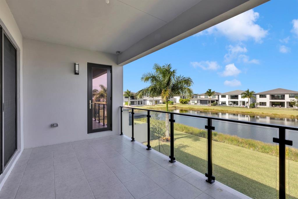 8571 Shoreacres Street Boca Raton, FL 33434 - Photo 8 of 95 Balcony Master & Loft with Glass Rails LAKE view
