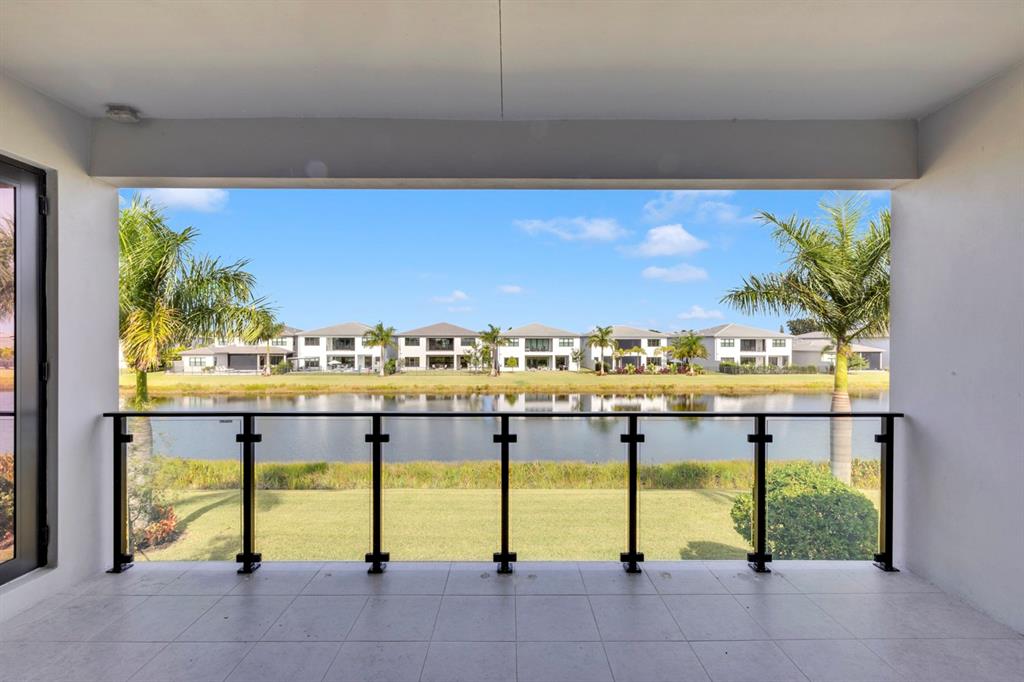 8571 Shoreacres Street Boca Raton, FL 33434 - Photo 9 of 95 Balcony Master & Loft 02 with Glass RailsLake View