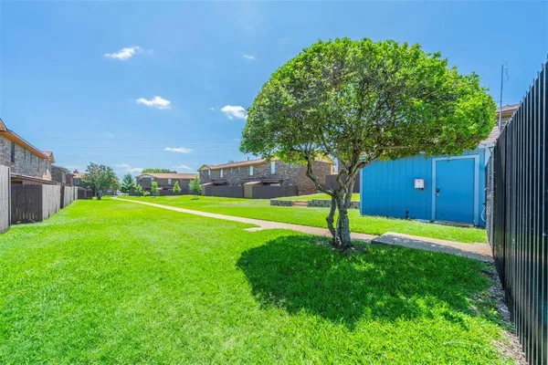a house with swimming pool in front of it