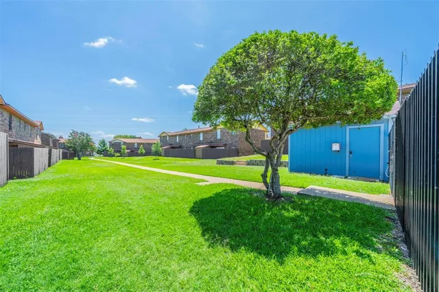 a house with swimming pool in front of it
