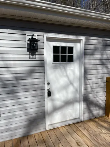 a view of kitchen with wooden floor