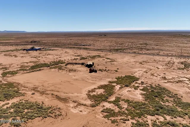 an aerial view of beach and ocean