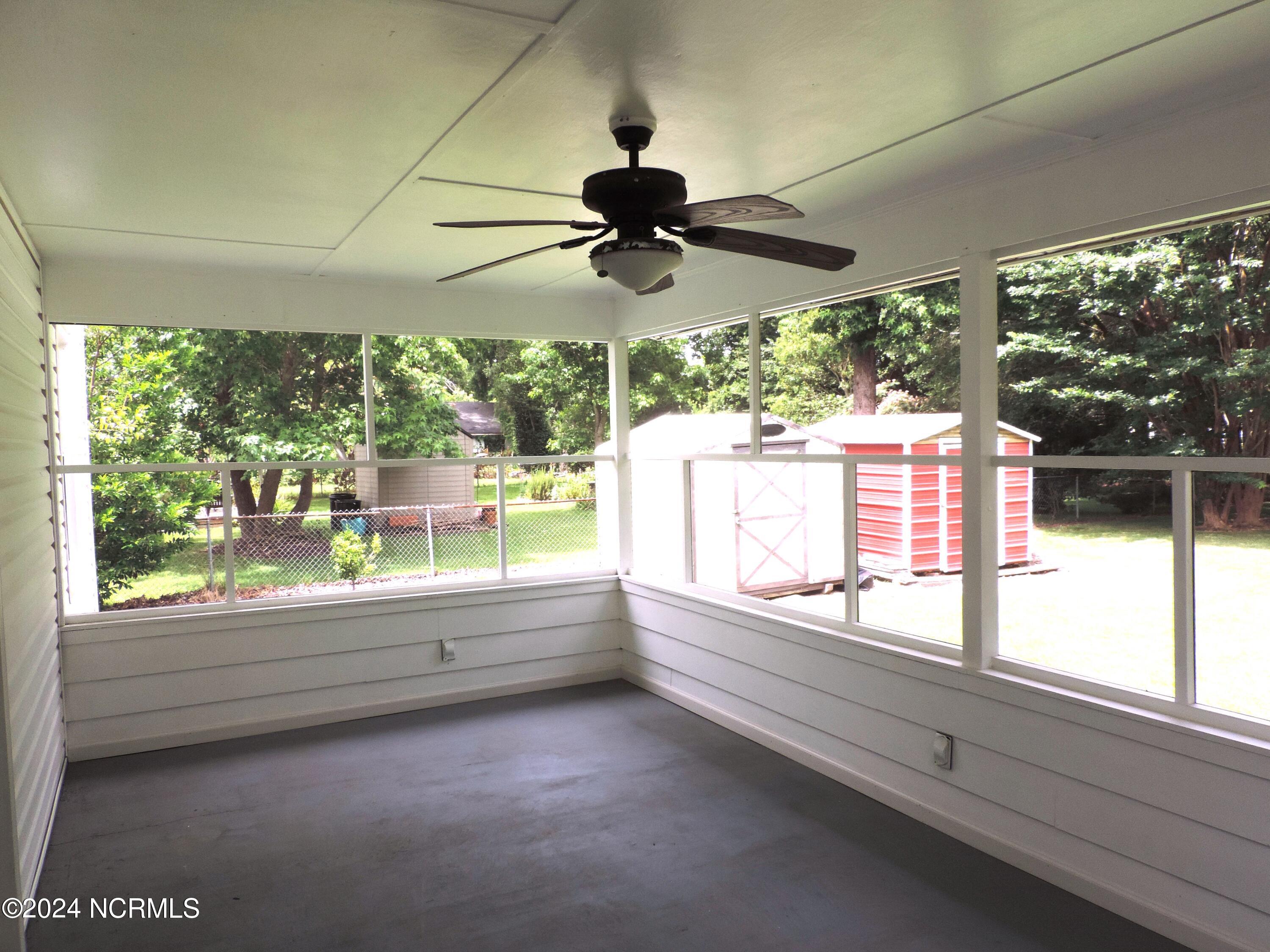111 Stratford Road Jacksonville, NC 28540 - Photo 20 of 44 Screened in Back Porch