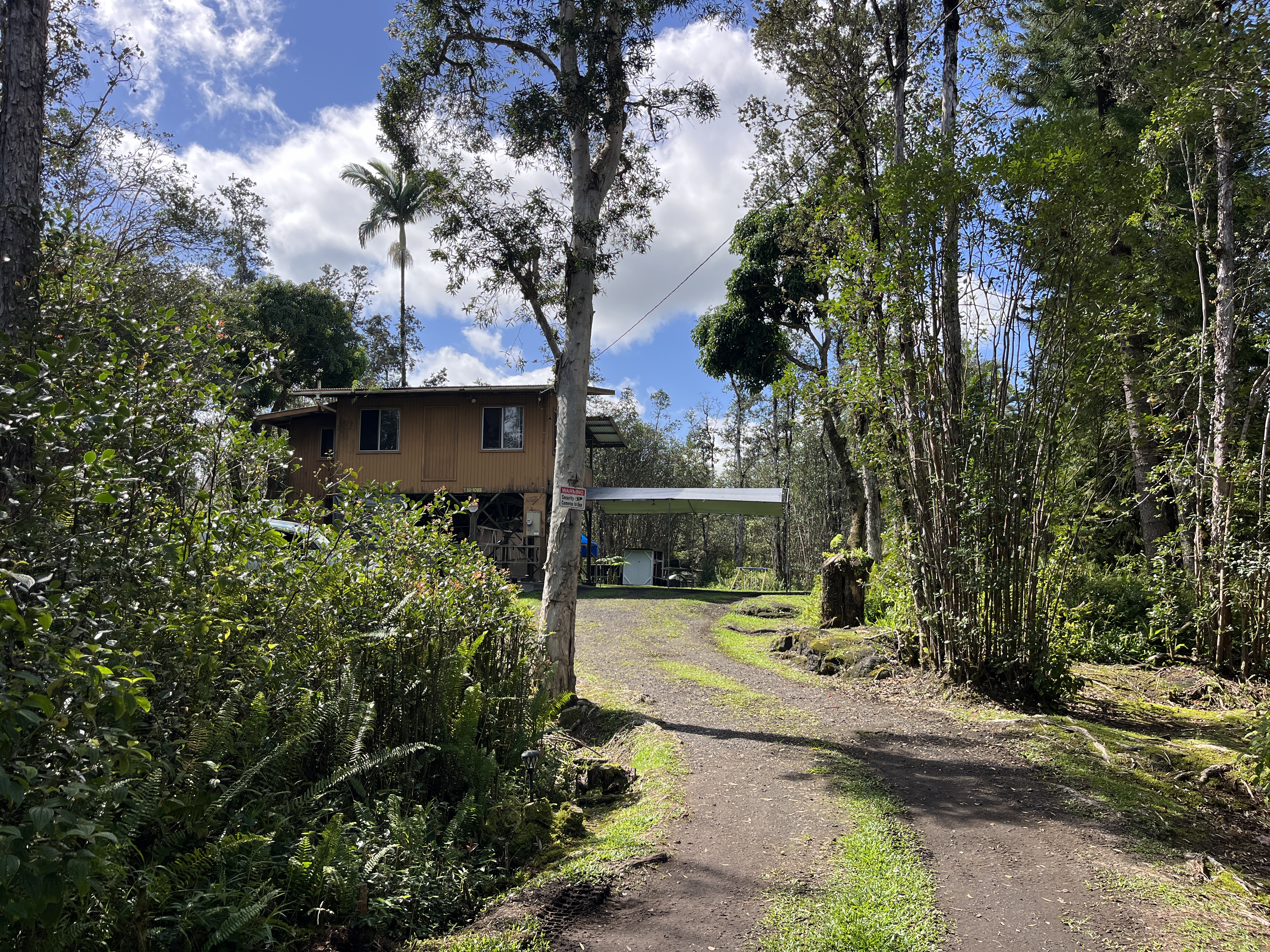 16-1088 Opeapea Road Kurtistown, HI 96760 - Photo 2 of 29 a view of a backyard
