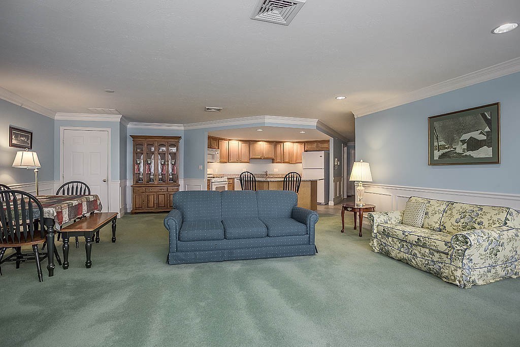 5 Mission Road, Unit 304 Chelmsford, MA 01863 - Photo 11 of 30 a living room with furniture and a large window