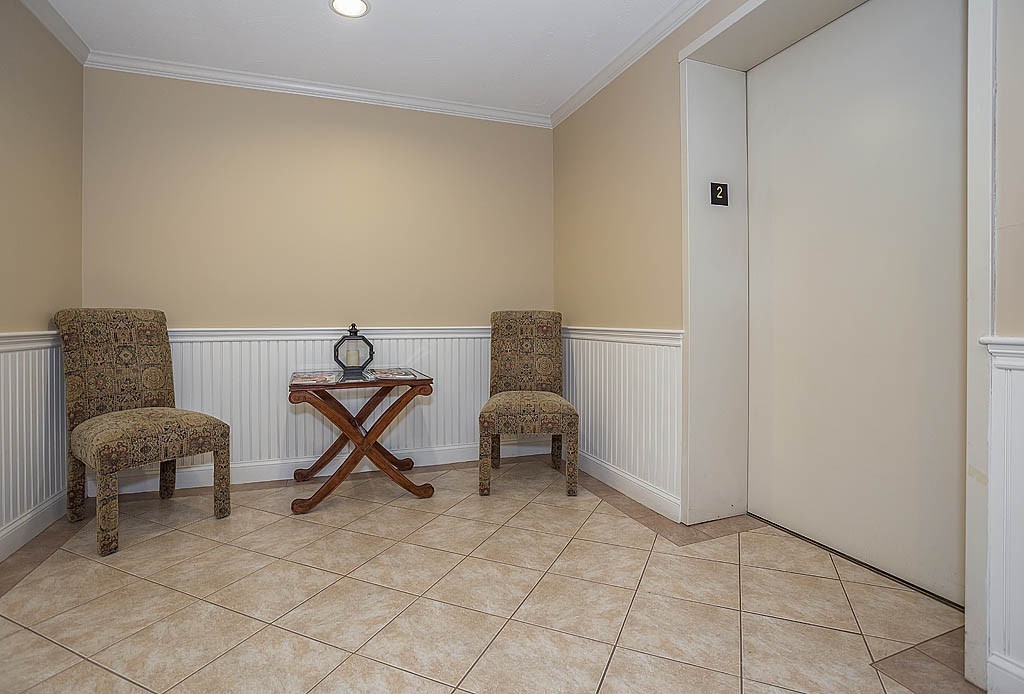 5 Mission Road, Unit 304 Chelmsford, MA 01863 - Photo 20 of 30 a living room with furniture
