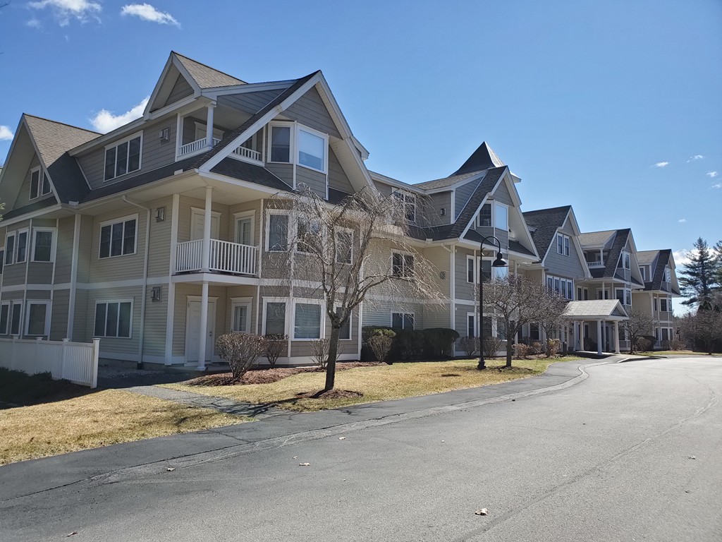 5 Mission Road, Unit 304 Chelmsford, MA 01863 - Photo 28 of 30 a view of a building with a street