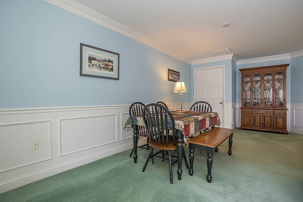 5 Mission Road, Unit 304 Chelmsford, MA 01863 - Photo 6 of 30 a view of a workspace with furniture and window