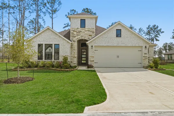 a front view of house with yard
