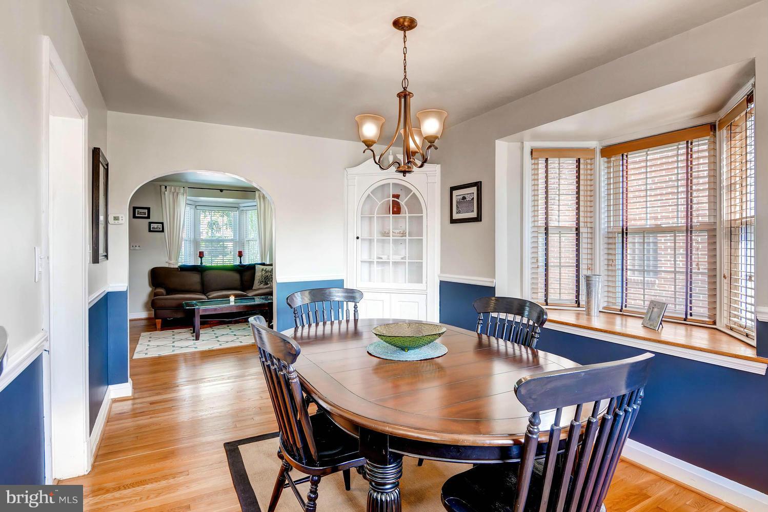 1615 Hardwick Road Towson, MD 21286 - Photo 11 of 30 a view of a dining room with furniture window and wooden floor