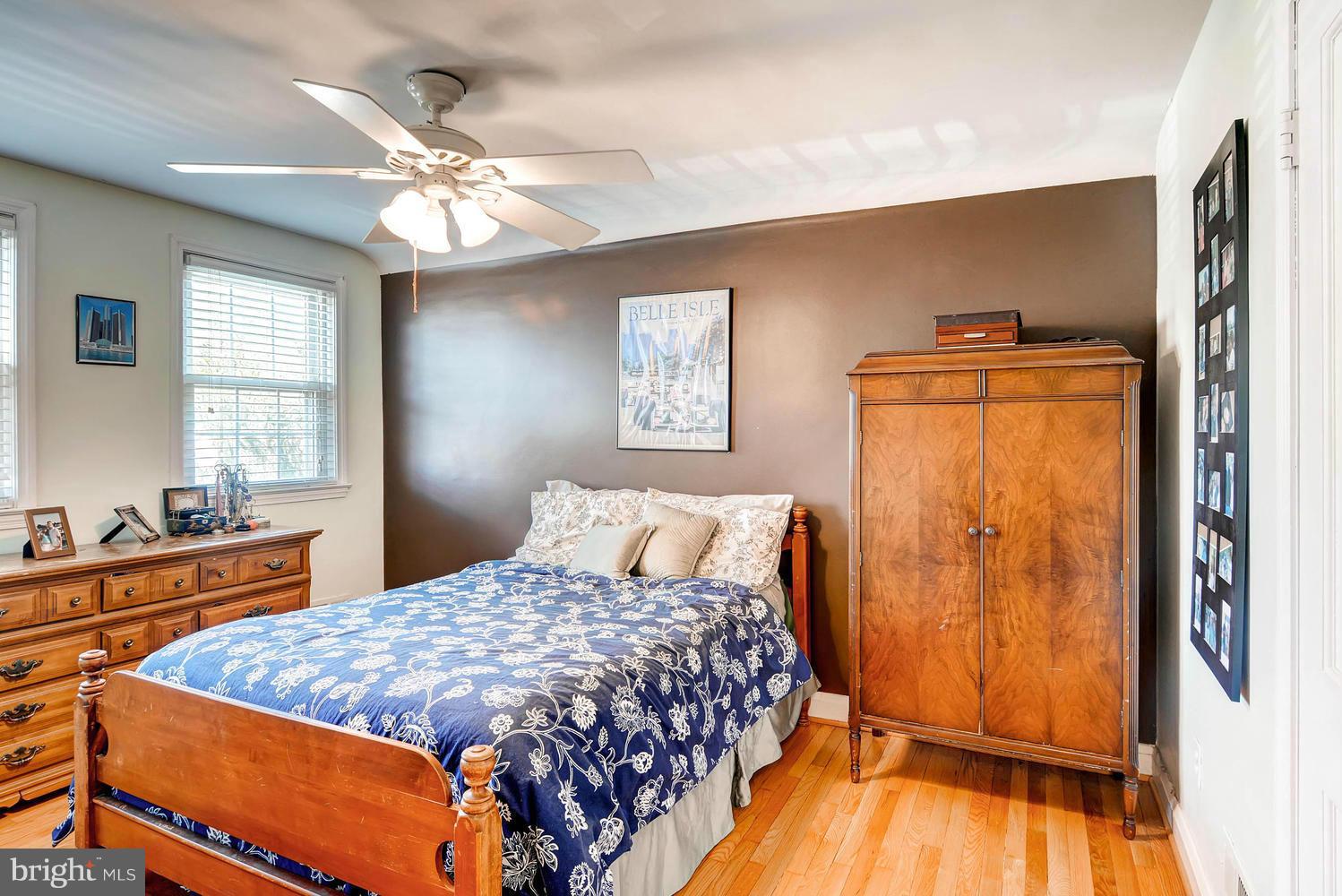 1615 Hardwick Road Towson, MD 21286 - Photo 16 of 30 a bedroom with a bed and wooden floor