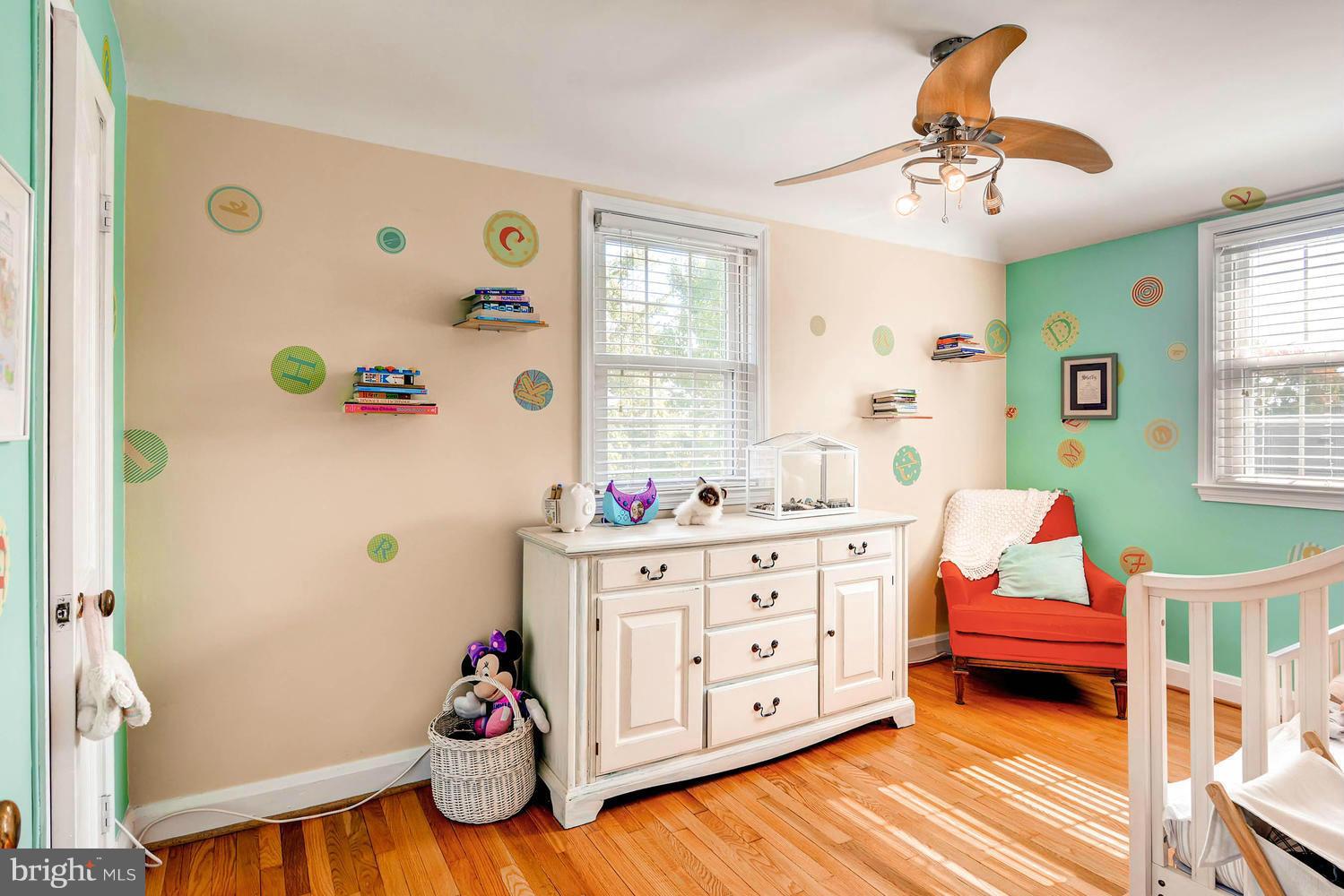 1615 Hardwick Road Towson, MD 21286 - Photo 19 of 30 a bedroom with a bed and wooden floor