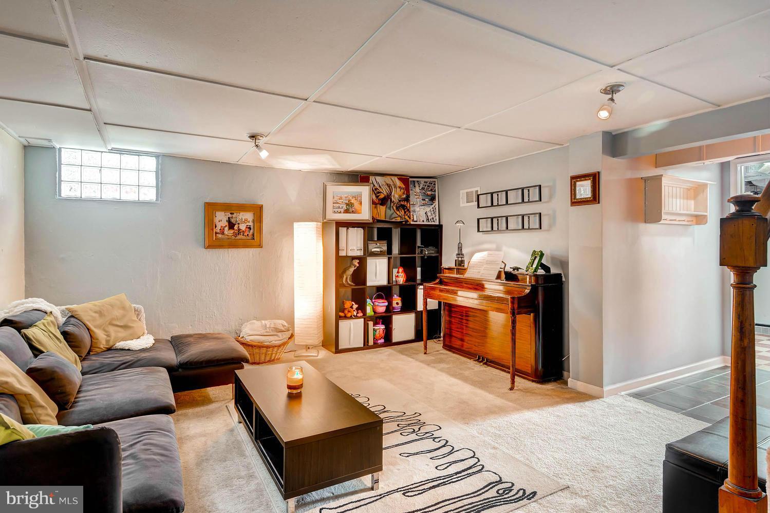 1615 Hardwick Road Towson, MD 21286 - Photo 22 of 30 a living room with furniture and wooden floor