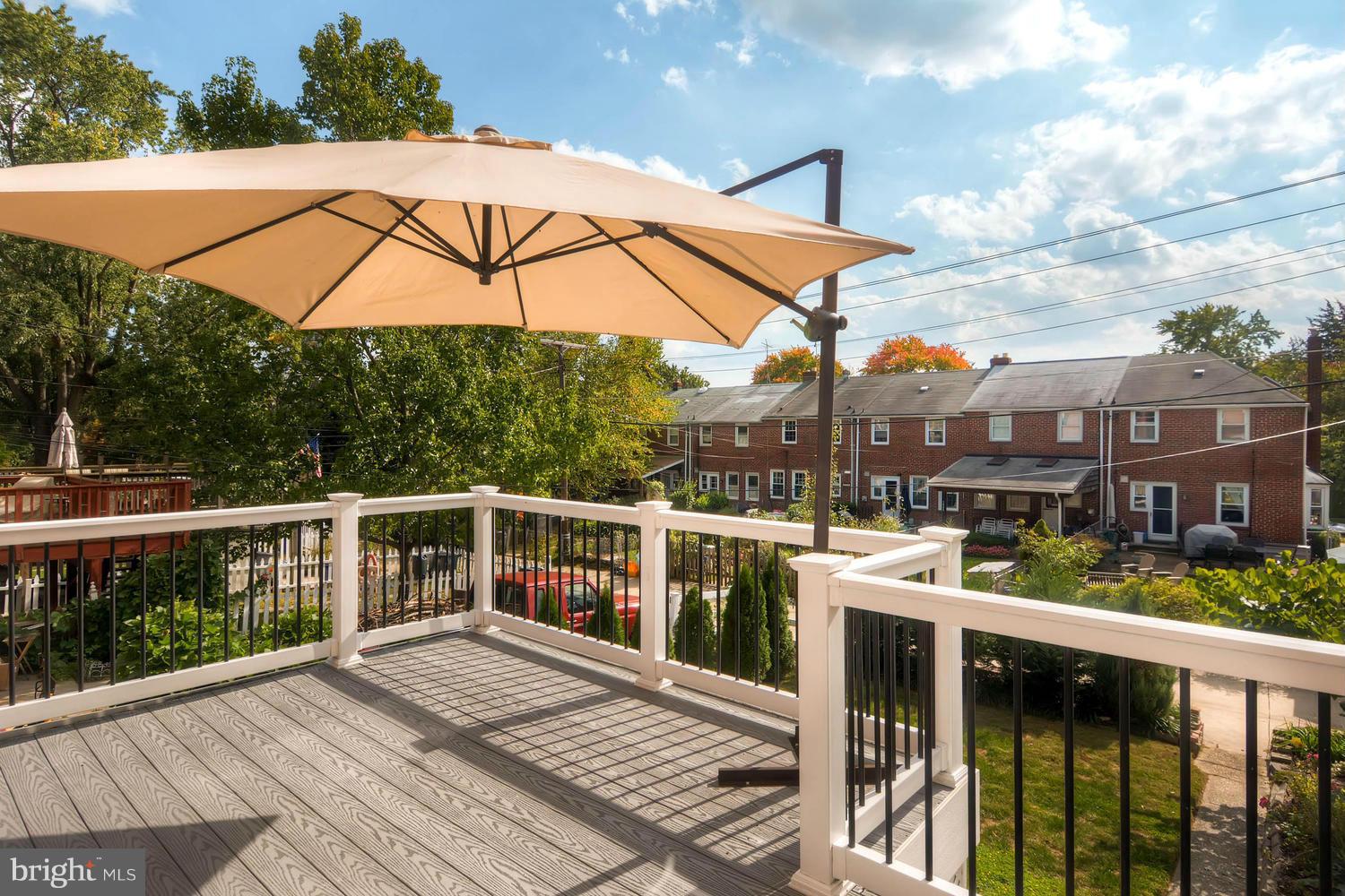 1615 Hardwick Road Towson, MD 21286 - Photo 26 of 30 a view of balcony with wooden floor and fence