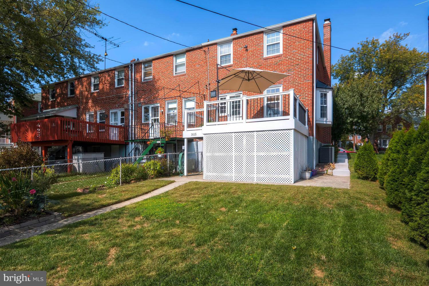 1615 Hardwick Road Towson, MD 21286 - Photo 28 of 30 a front view of a house with a yard
