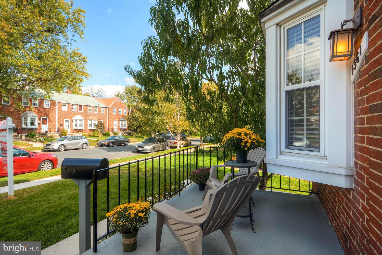 1615 Hardwick Road Towson, MD 21286 - Photo 5 of 30 a view of a patio with couches chairs and a yard