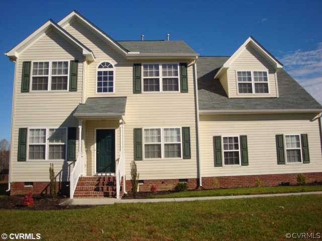 5506 Willow Grove Road Chesterfield, VA 23832 - Photo 1 of 9 a front view of a house with a yard