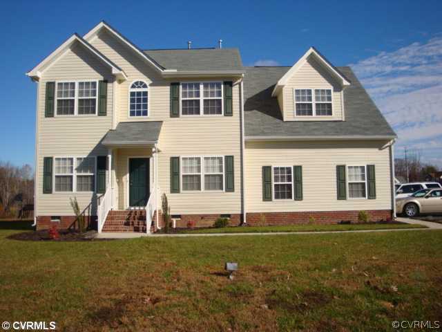 5506 Willow Grove Road Chesterfield, VA 23832 - Photo 2 of 9 a front view of a house with a yard
