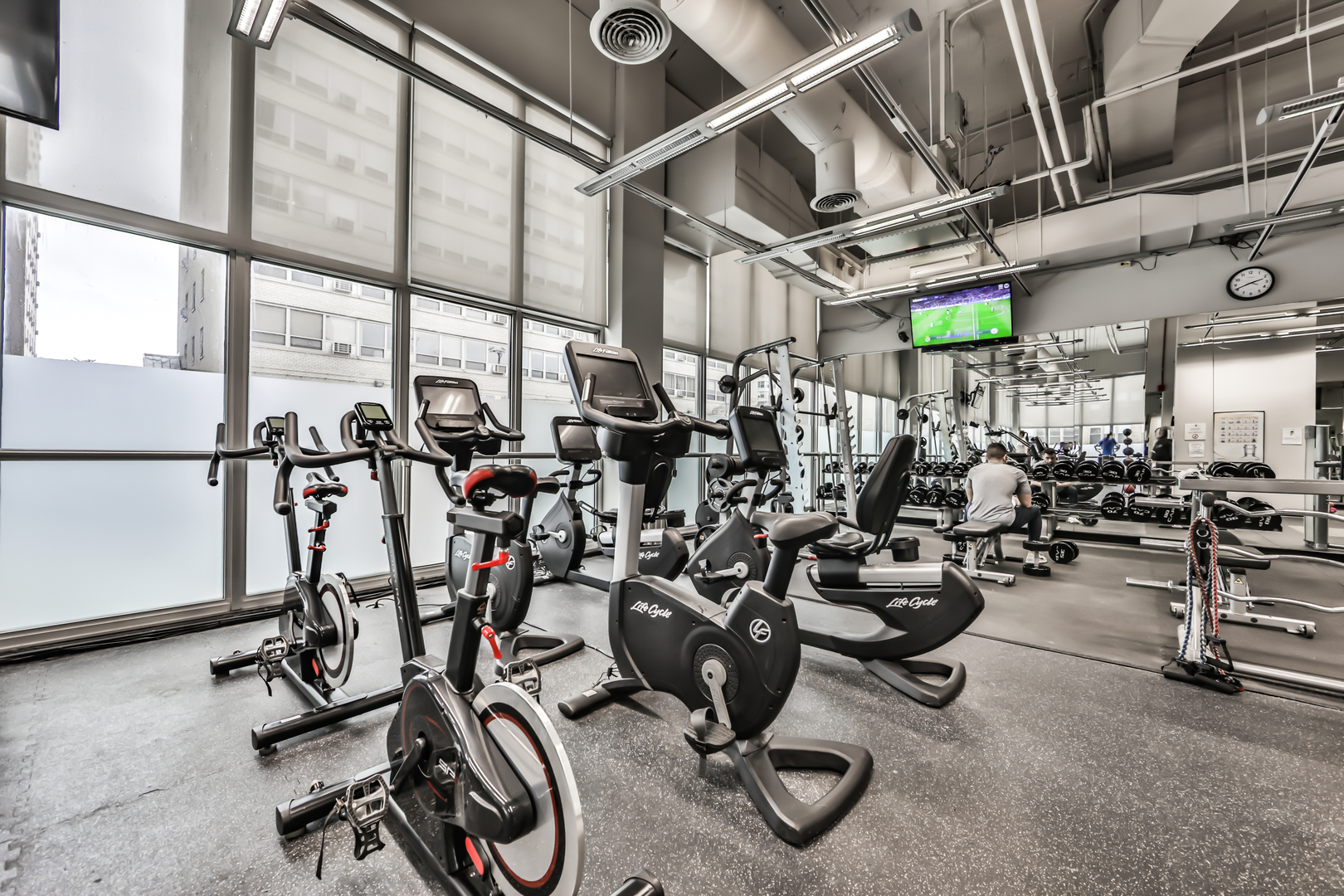 655 West Irving Park Road, Unit 3810 Chicago, IL 60613 - Photo 26 of 26 a view of a room with gym equipment