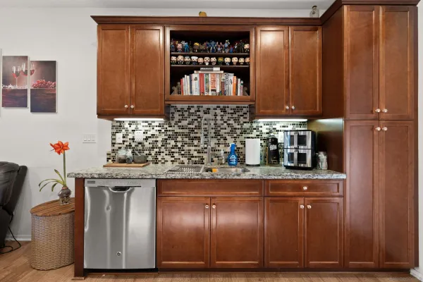 a kitchen with a sink and a stove