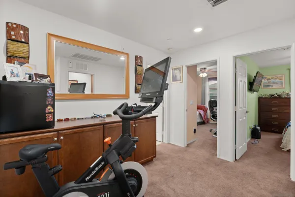 a view of a room with gym equipment