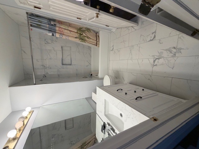209 North Southport Road Mundelein, IL 60060 - Photo 15 of 18 a bathroom with a bathtub and a shower